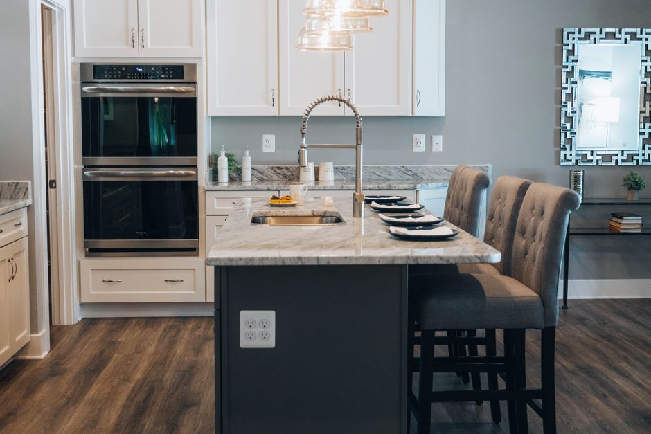 Beautiful kitchen island with marble countertop and custom base
