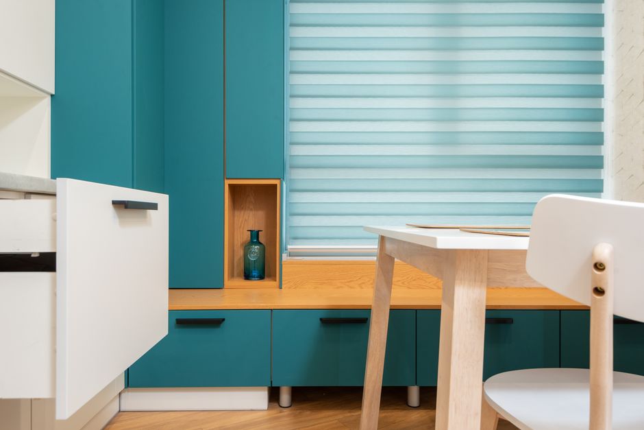Close up of kitchen cabinet with elegant brass handles